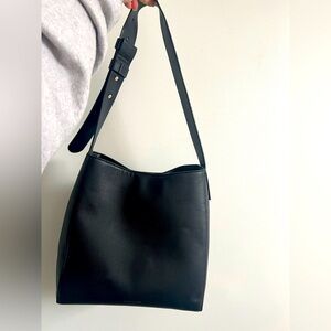 Gently used black leather bag